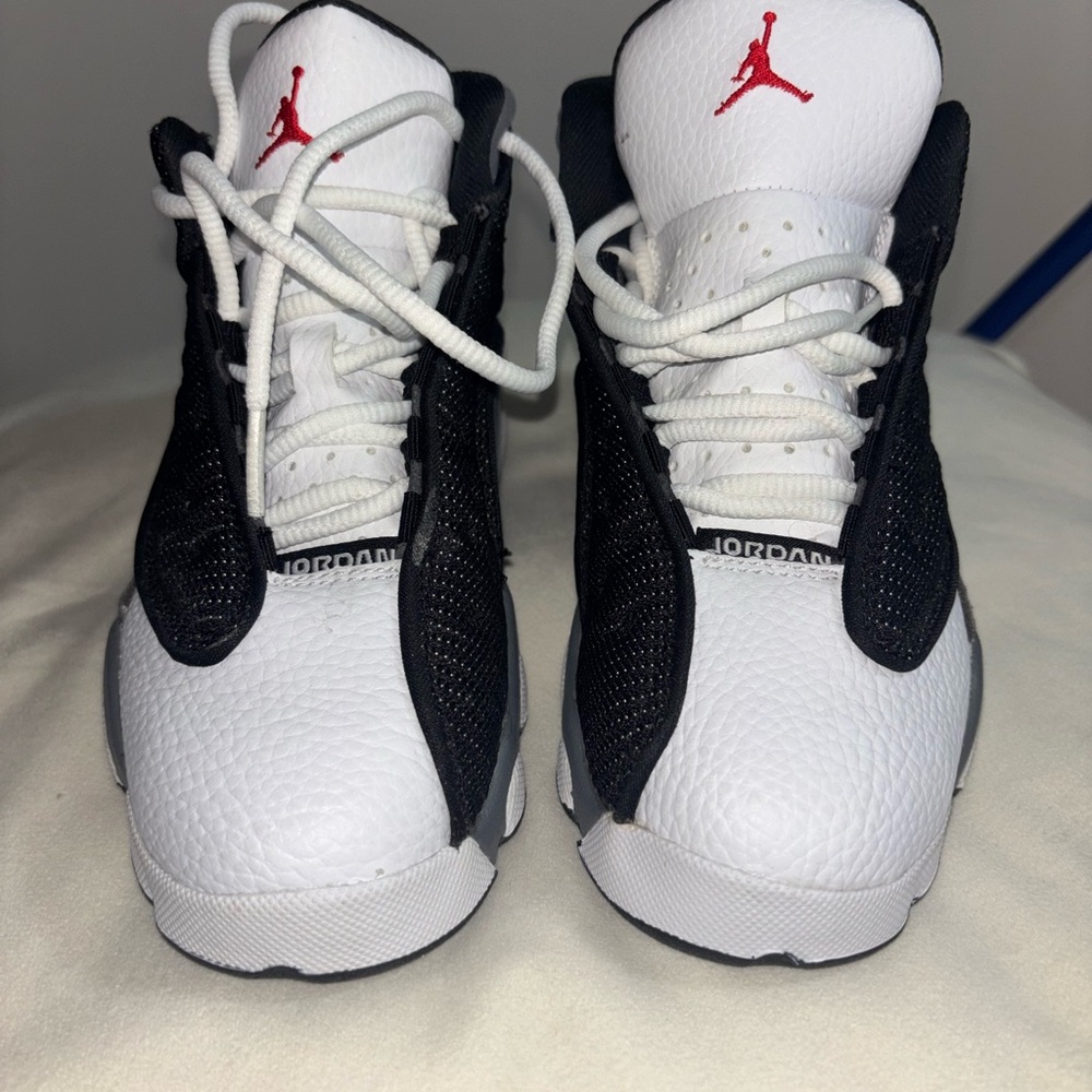 Air Jordan Retro 13 Sneakers in dark blue and White with Red Details